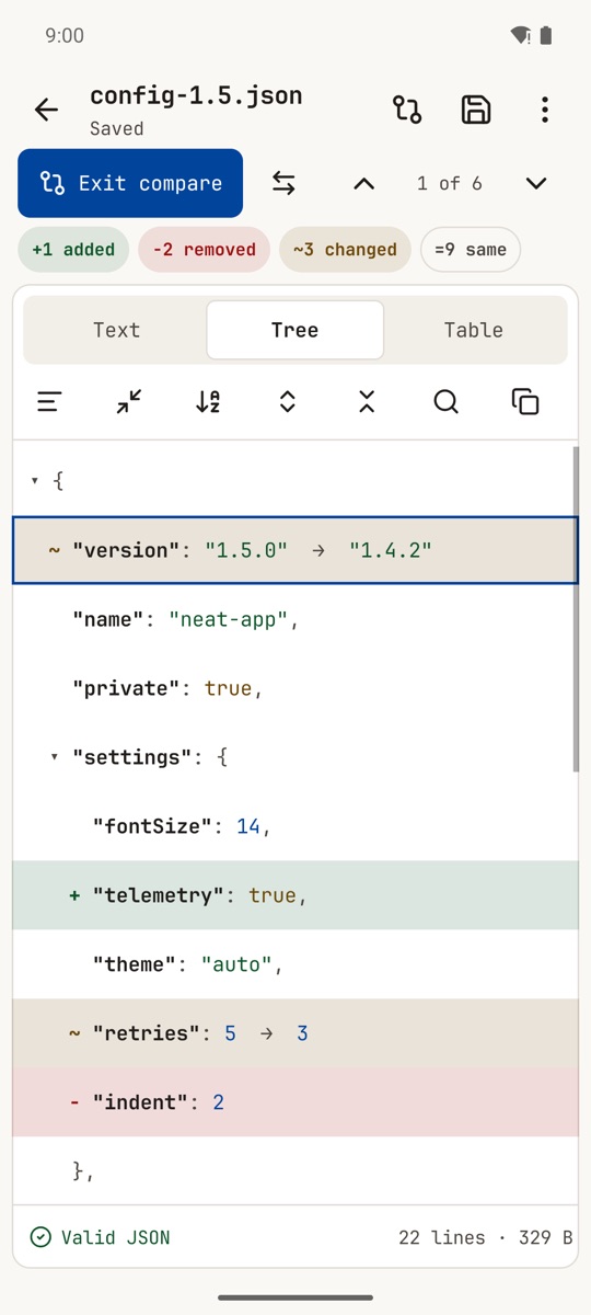 Compare: two versions of a file, with a changed version number, an added key and a removed key marked.